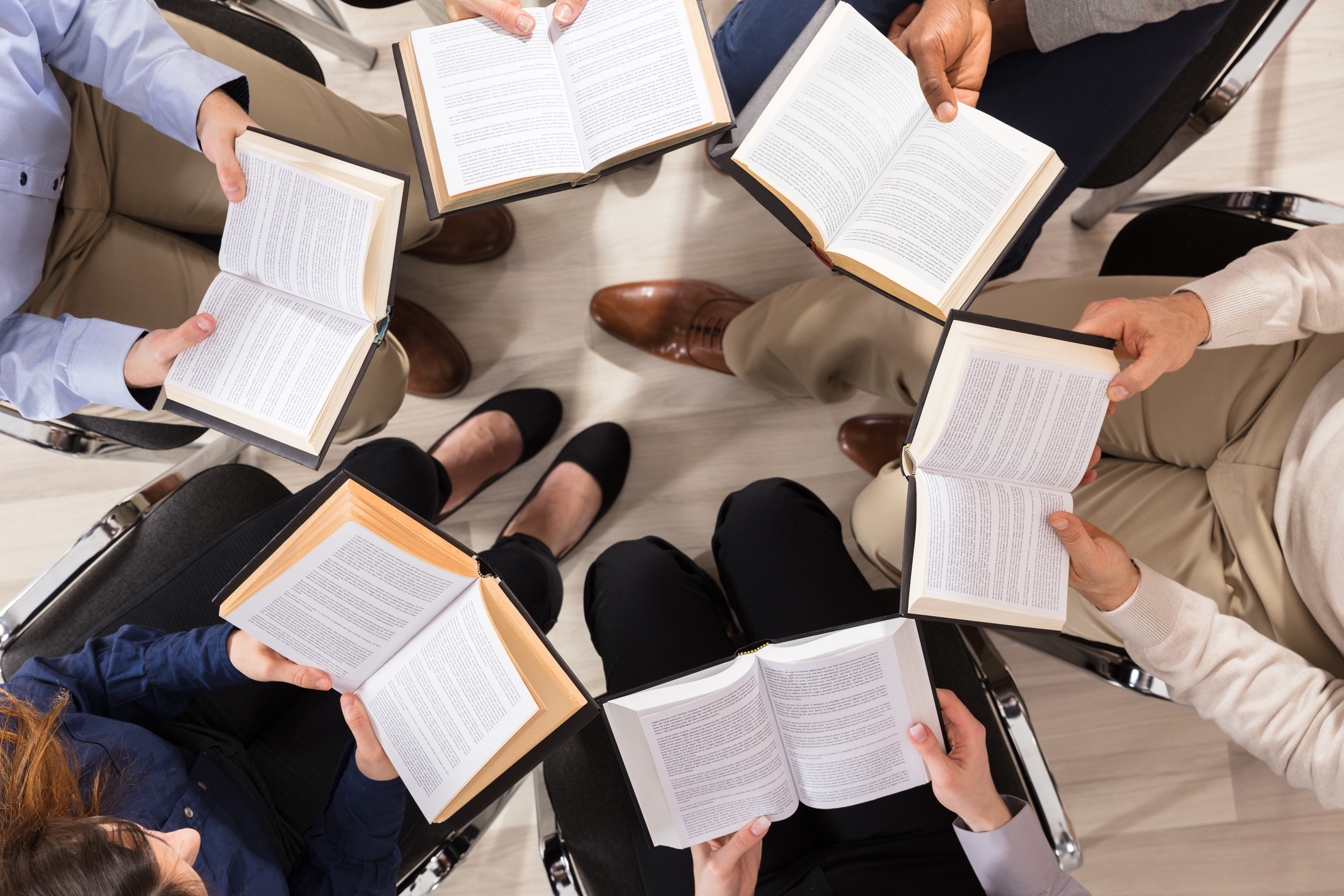 Group Of Diverse People Reading Books